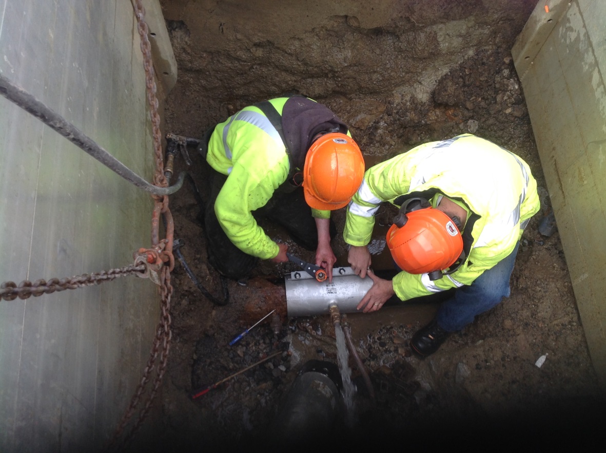 Men Working on Water Distribution
